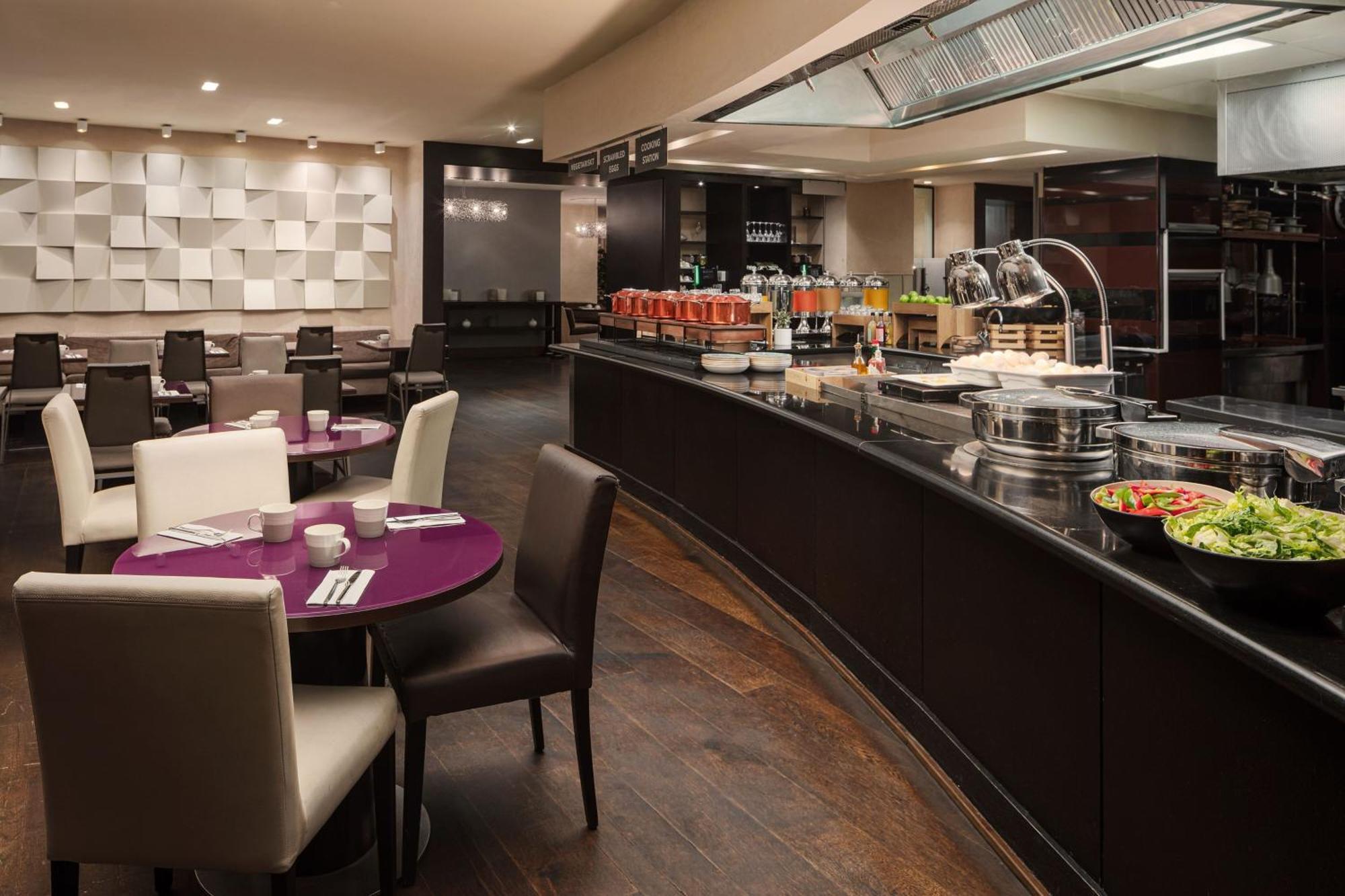 Sheraton Stockholm Hotel Esterno foto The restaurant